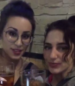 cheers with draft beer at monaghans sports pub and grill oakville ontario