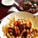poutine and wings and beer at monaghans sports pub and grill oakville ontario